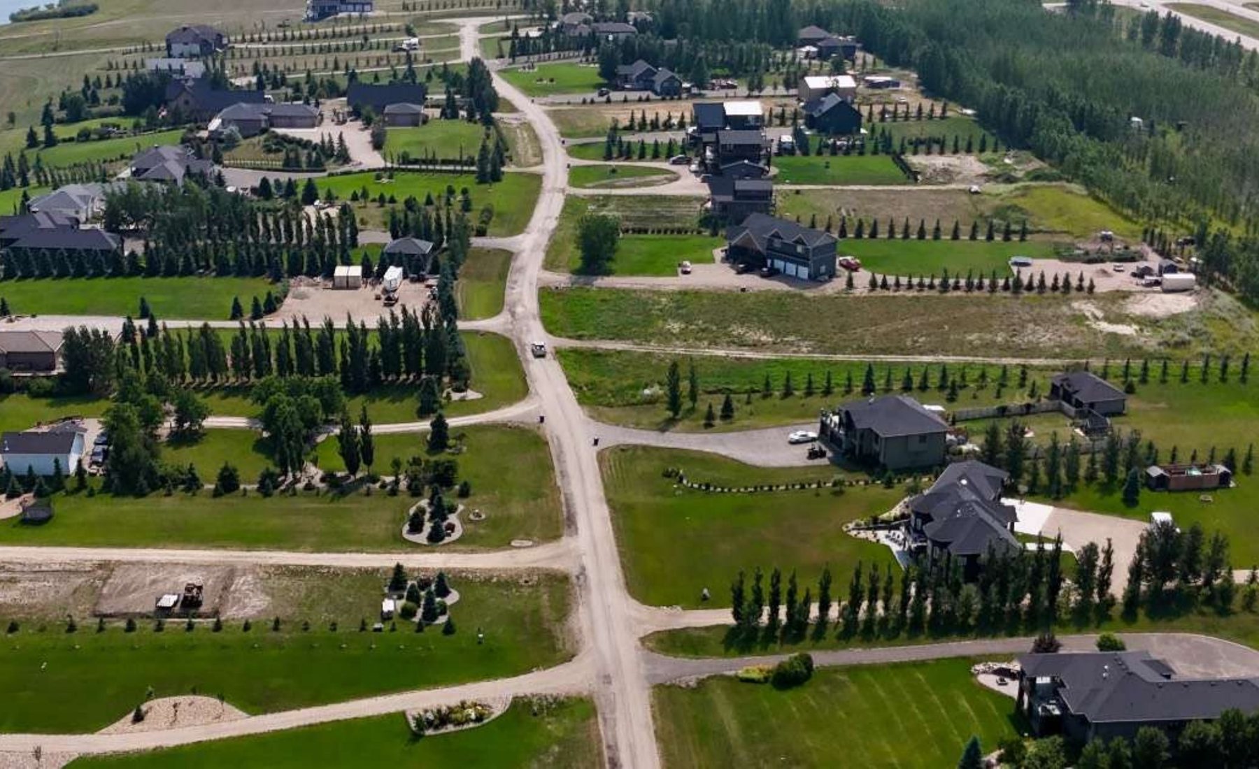 Established homes and paved roads throughout the community